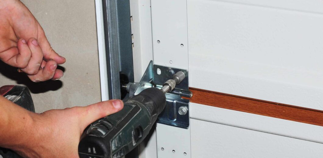 Contractor repair and replace garage door. Garage door installation.