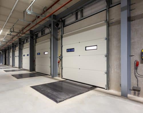commercial garage door maintenance on warehouse