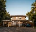 Modern house with a car parked under a carport