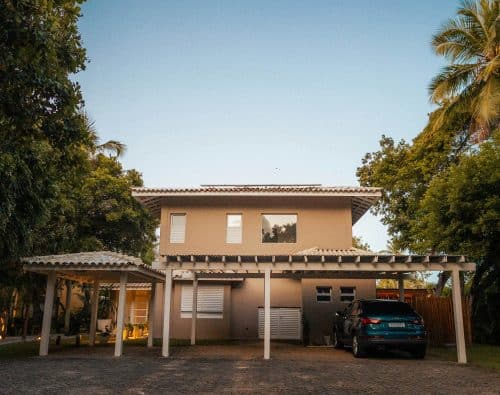 Modern house with a car parked under a carport
