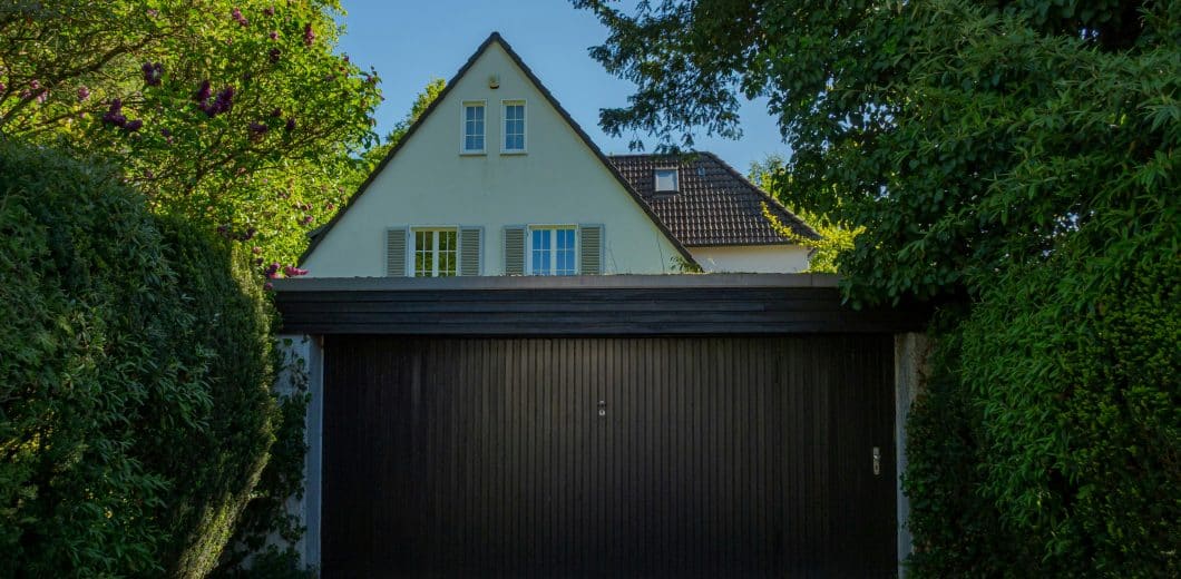 House with a large dark garage door