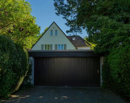 House with a large dark garage door