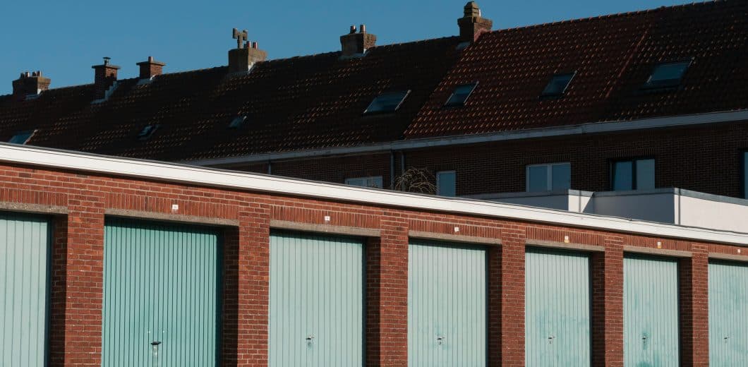 White and red building under blue sky