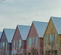 Row of modern houses with gabled roofs