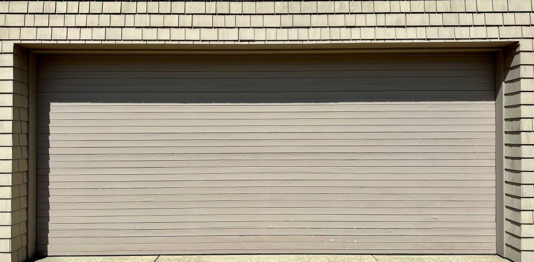 White garage door on a residential building