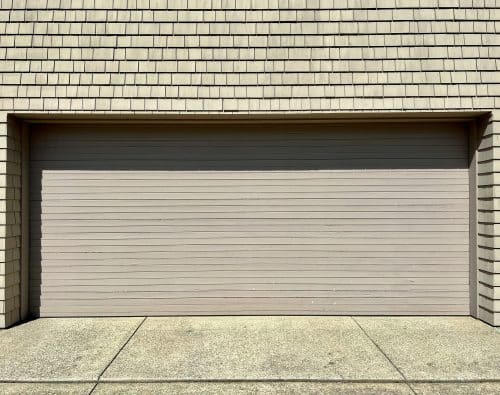 White garage door on a residential building