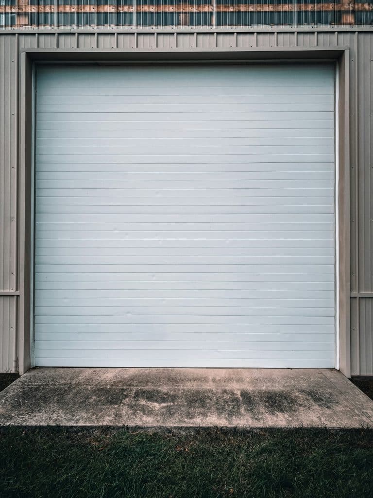 White roll-up garage door in closed position