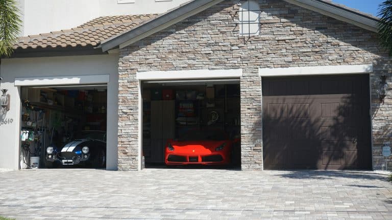 Car parked inside the garage of a residential home