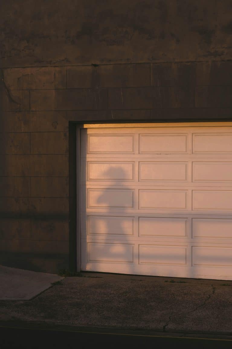 White garage door on a residential home in daylight