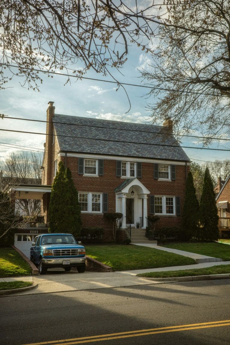 Brick house with a truck in the driveway