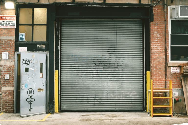 Black roll-up garage door in closed position