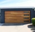 Modern wood panel garage door on a Parker area home